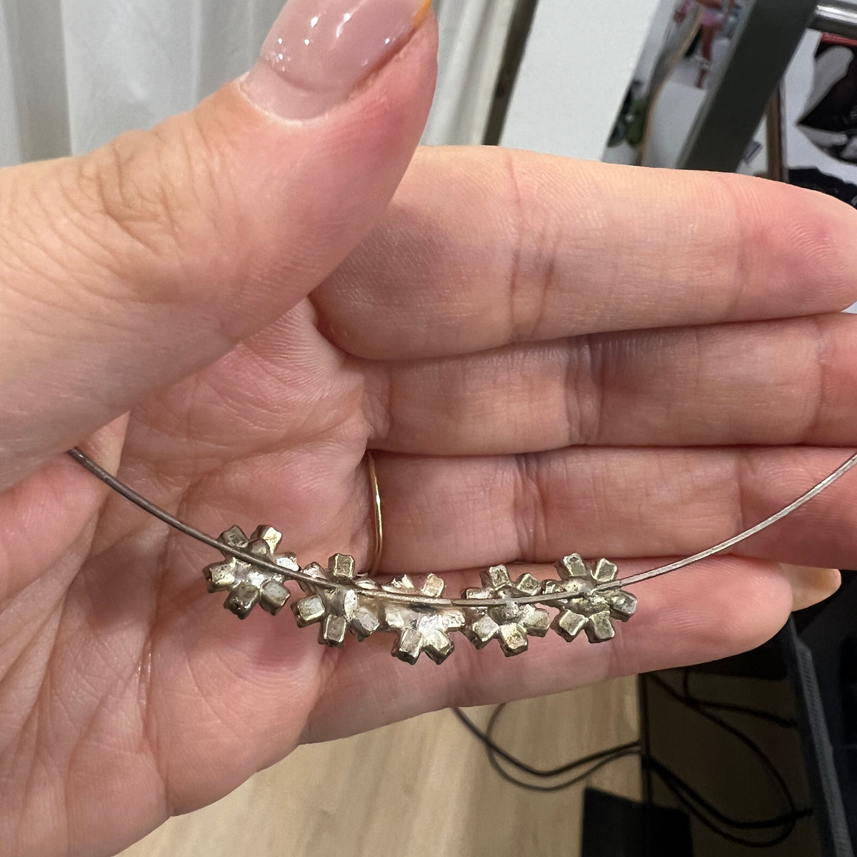 silver wire choker with little rhynestone flowers
