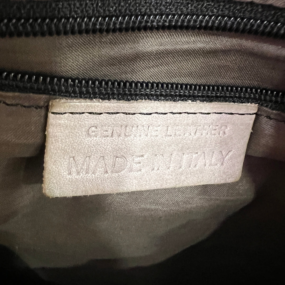 artisanal grey leather shoulder bag with crossbody strap