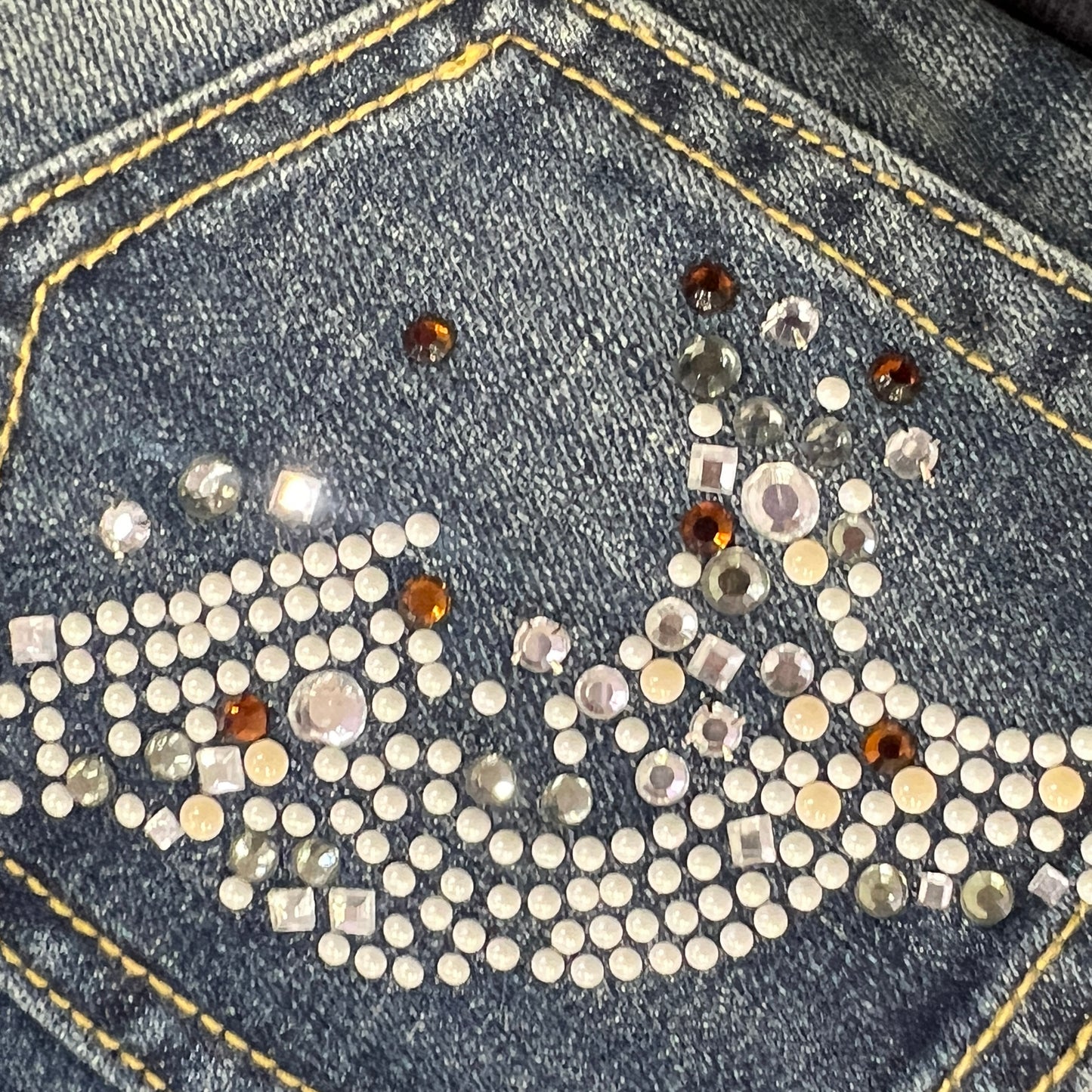 eighth sin 00s distressed dark wash mini skirt with pearls and secret inside pocket