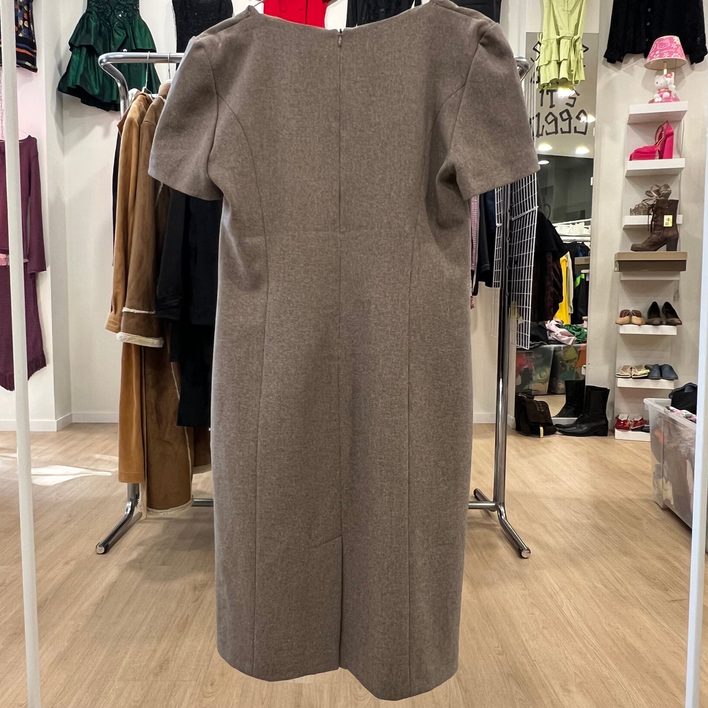 Brown dress on a rack in a clothing store