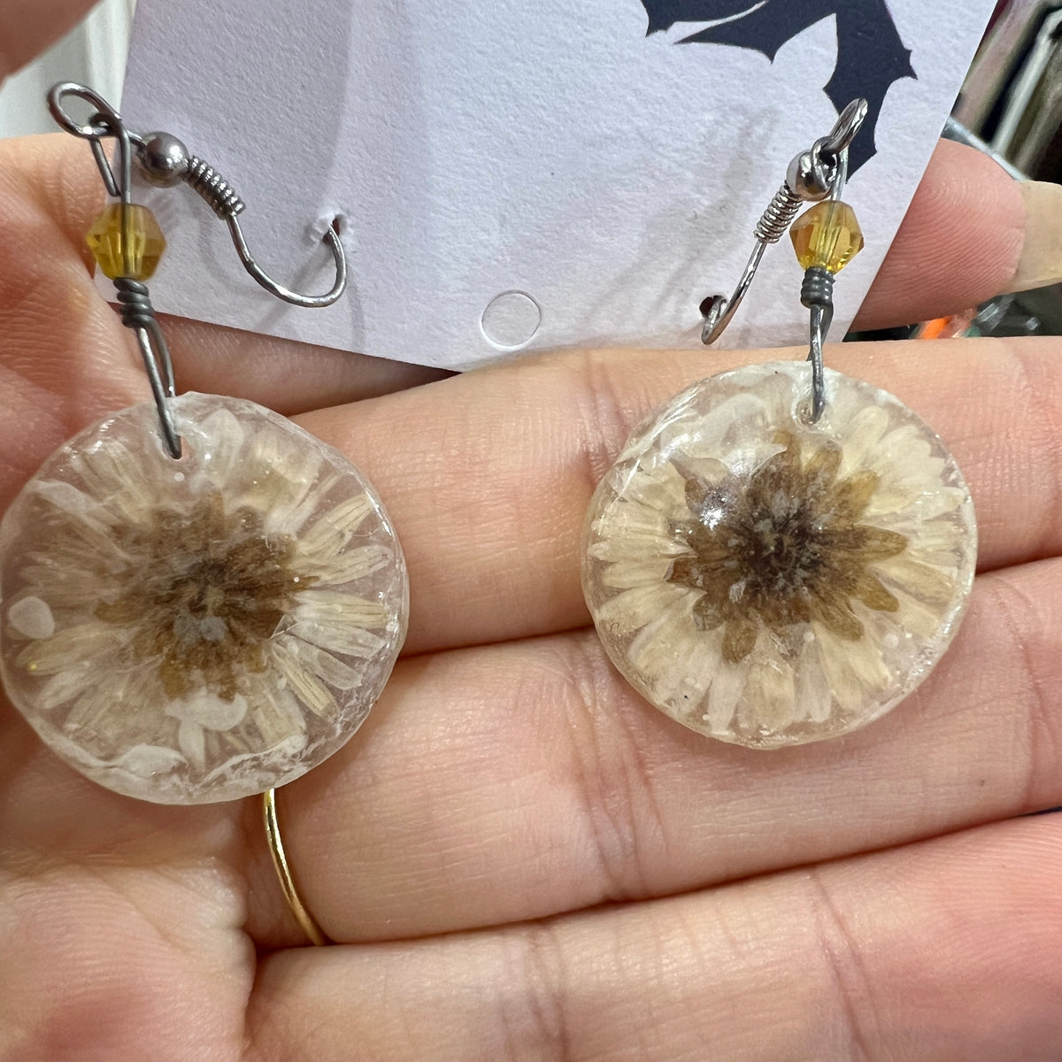 dried flowers in clear resin pendant earrings