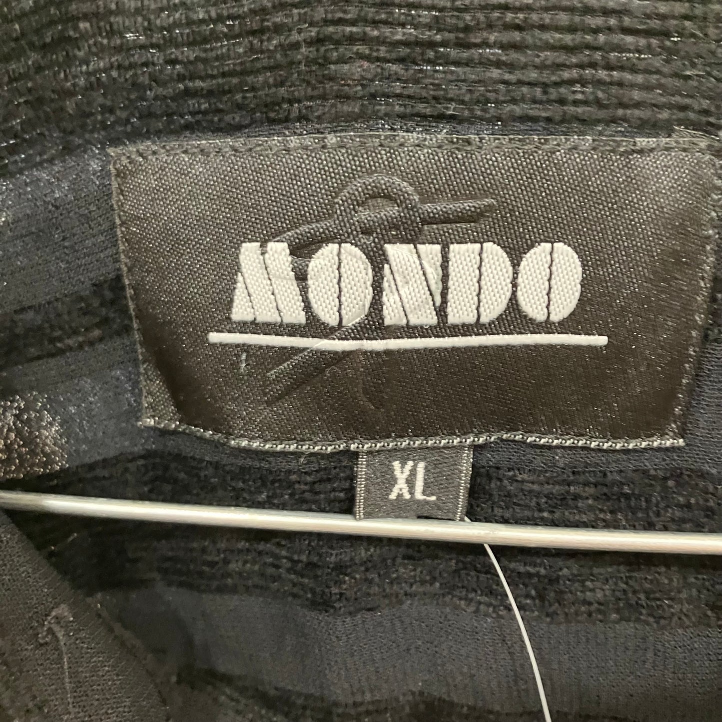Black jacket with 'Mondo' brand label and 'XL' size tag