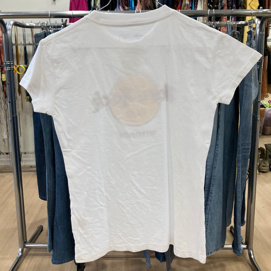 White t-shirt on a clothing rack