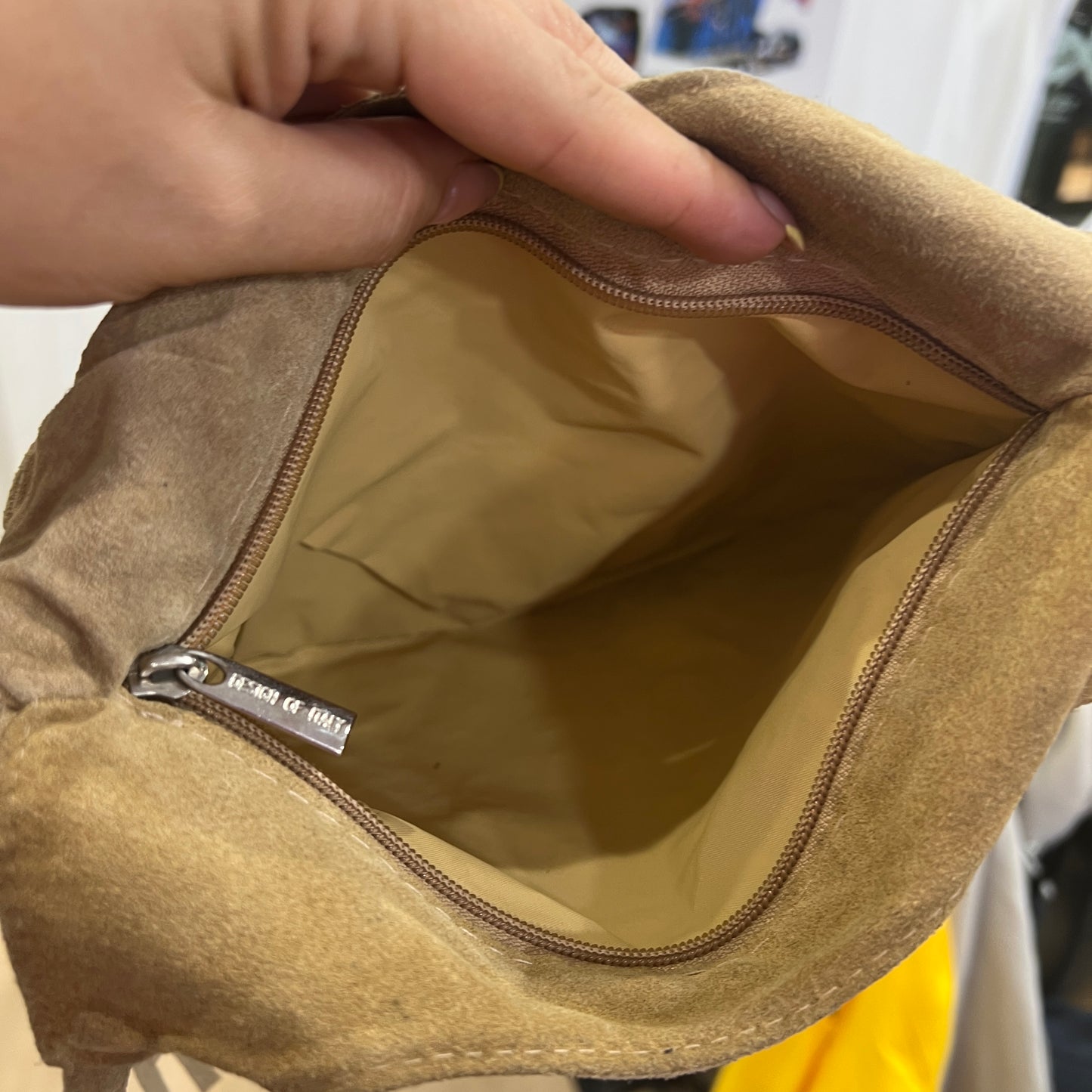beige suede shoulder bag with fringes