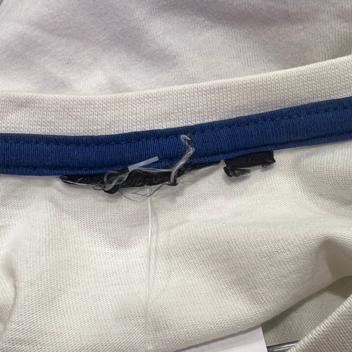 NFL white tee with blue red shield logo