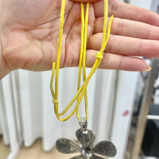 silver metal maxi flower pendant necklace with yellow adjustable faux suede string