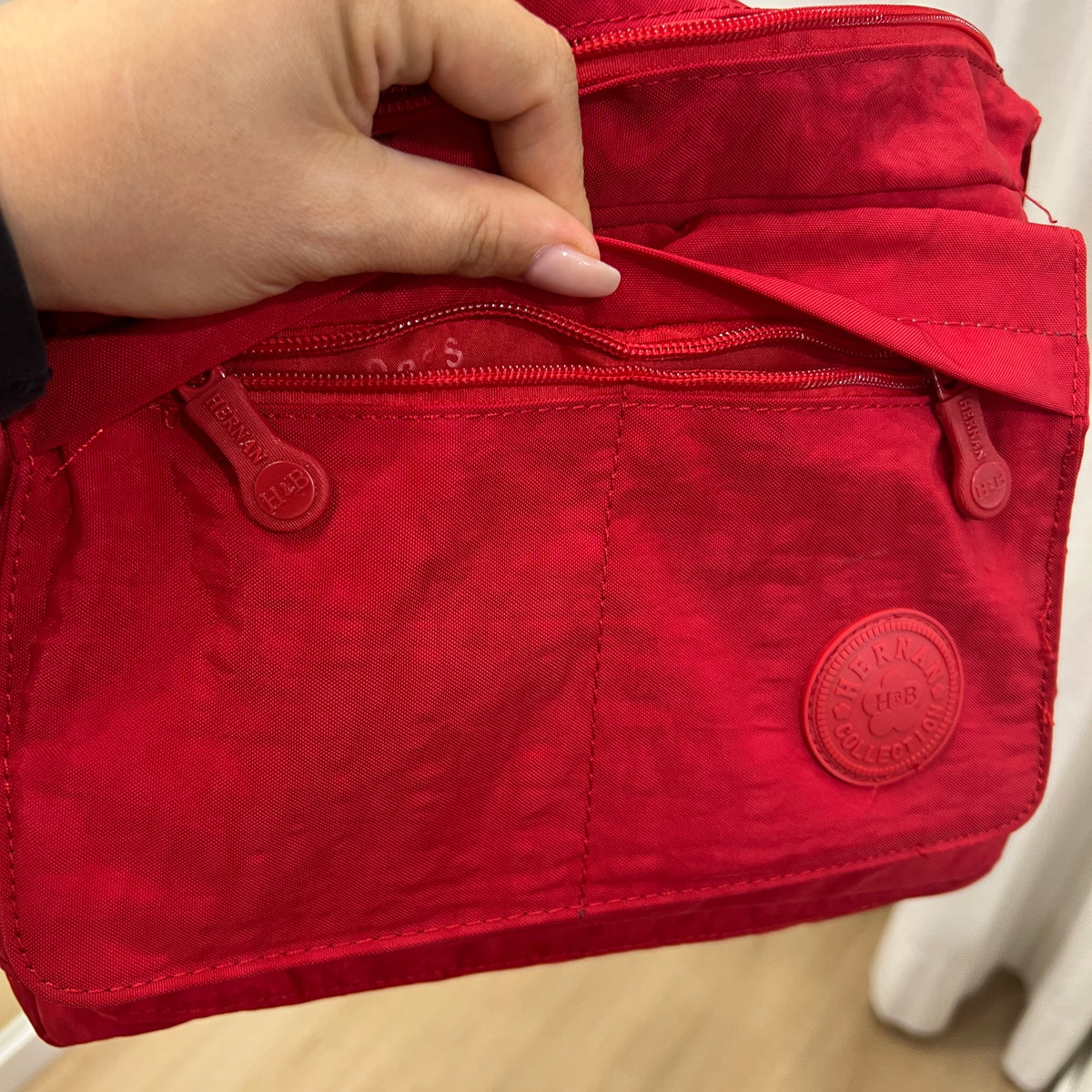 hernan h&b red canvas cross body bag with pockets