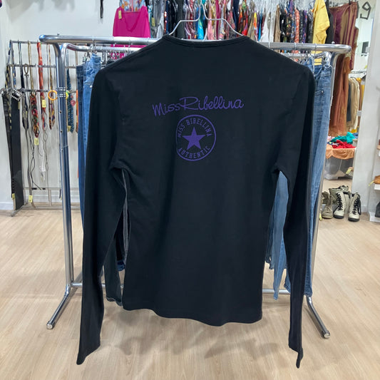 Black long-sleeve shirt with a logo on a mannequin in a store setting