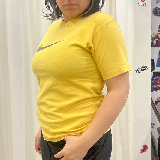 nike 00s yellow tshirt with black swoosh logo