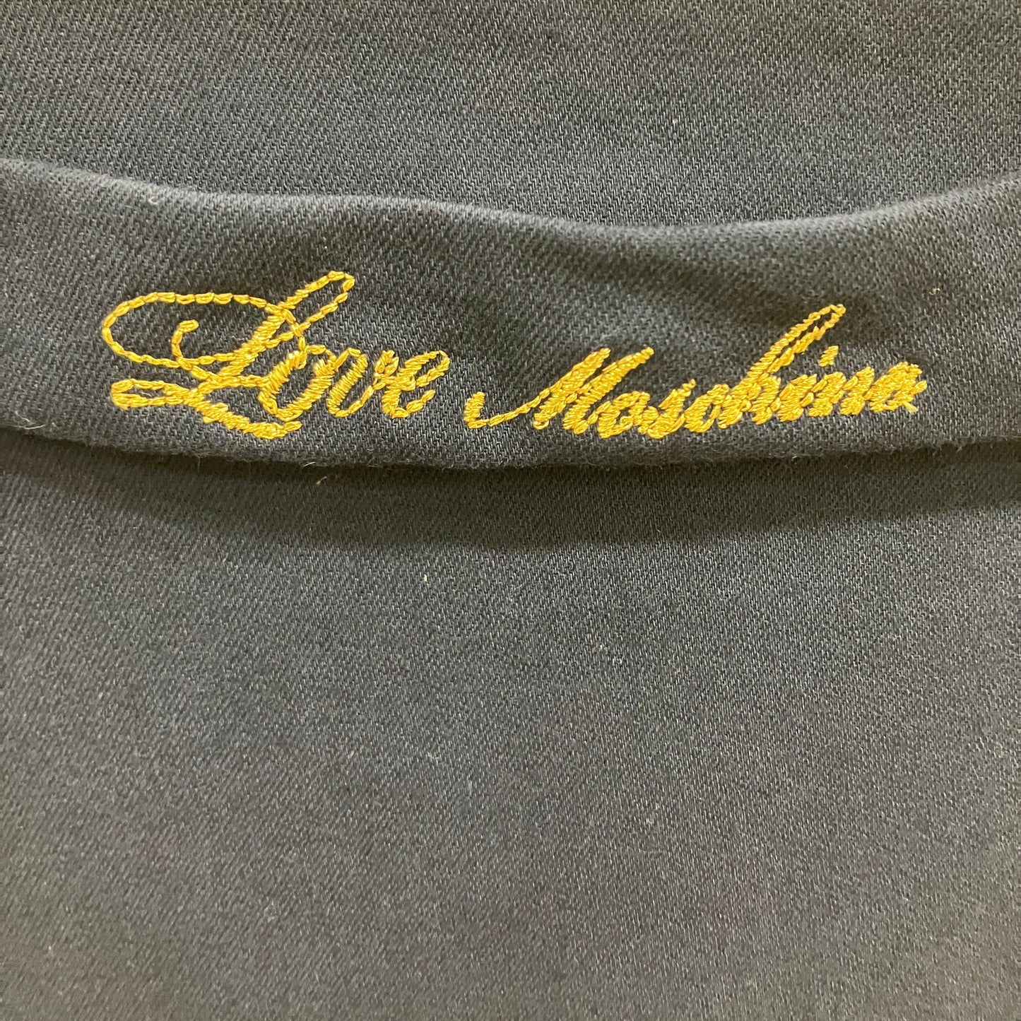 Gray fabric with 'Love Moschino' embroidery in yellow