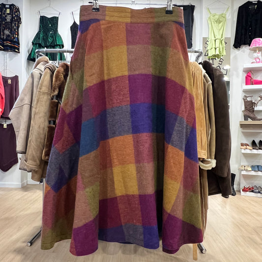 Multicolored checkered skirt on a rack in a clothing store