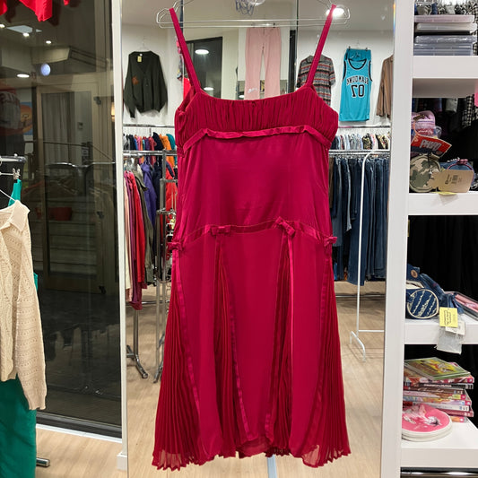 Red dress on a rack in a clothing store