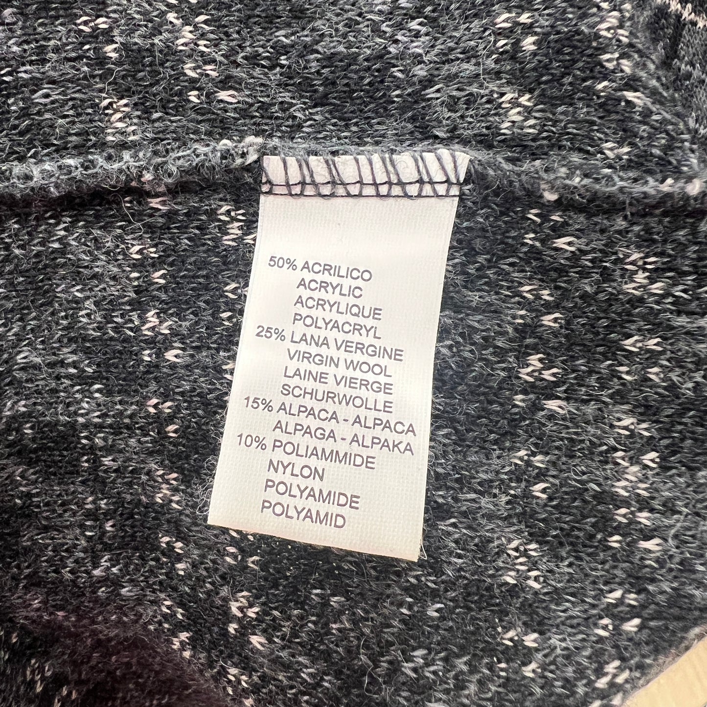 Fabric label on a textured fabric with material composition details