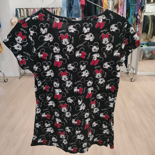 Black t-shirt with Mickey and Minnie Mouse cartoon print, displayed in a secondhand clothing store