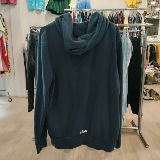 Dark blue hoodie with a brand logo on a clothing rack in a store