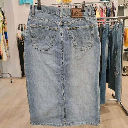 Denim skirt on a rack in a store setting