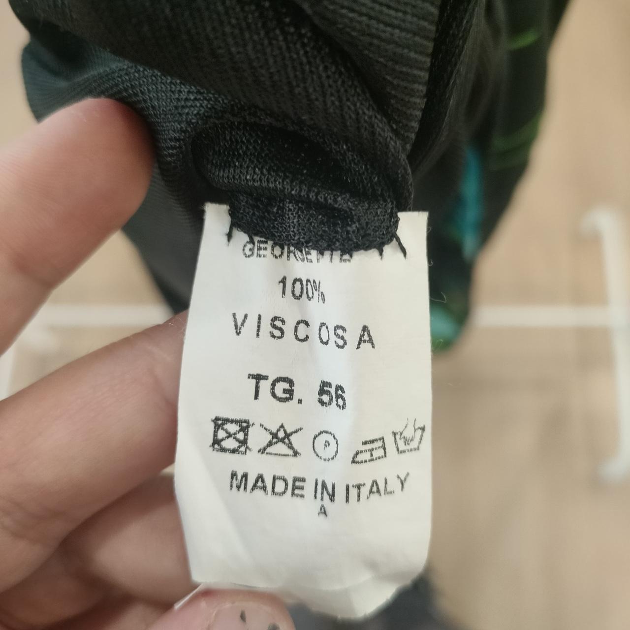 Clothing label showing 100% viscose, size 56, Made in Italy, care symbols visible