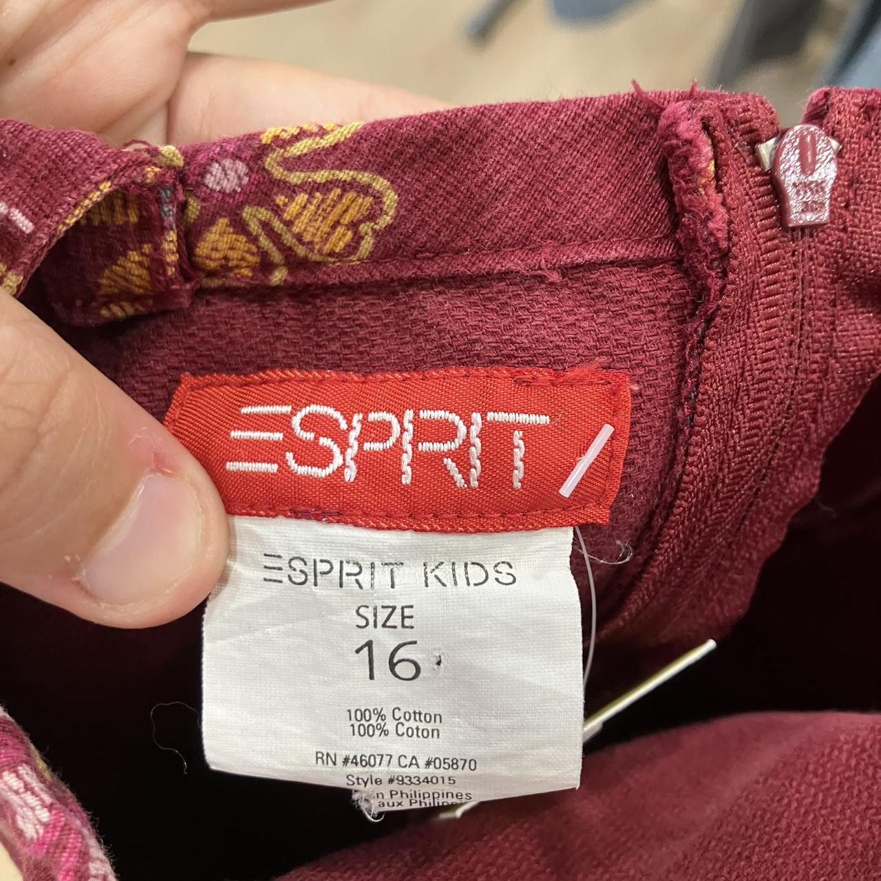 Close-up of Esprit Kids size 16 maroon cotton clothing label, sustainable fashion