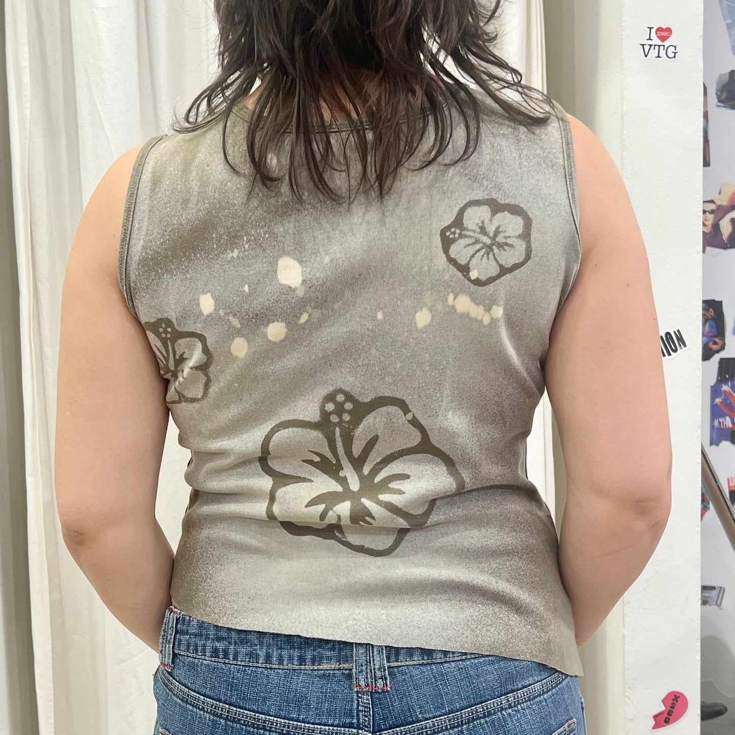 reworked khaki tank top with diagonal cut and hawaiian flowers bleach print