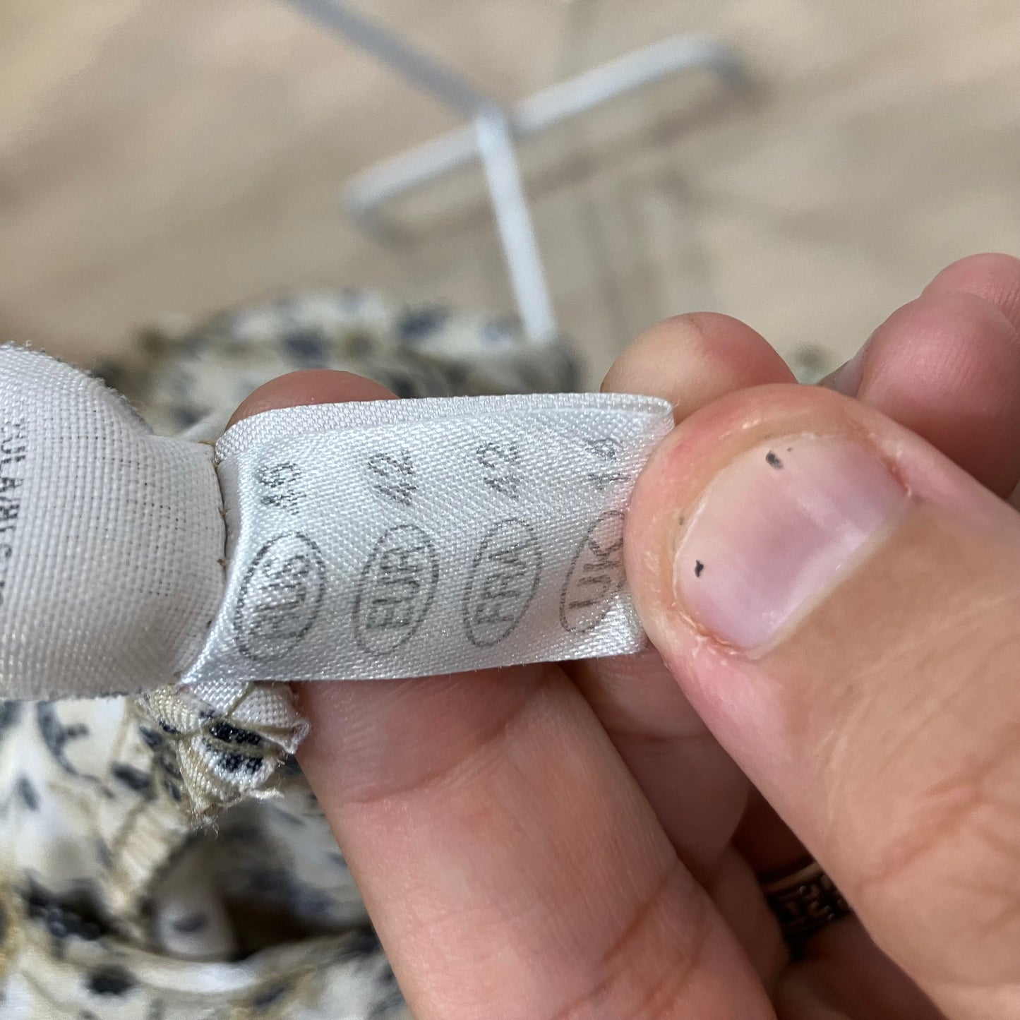 gold shiny short sleeve shirt with black geometric print