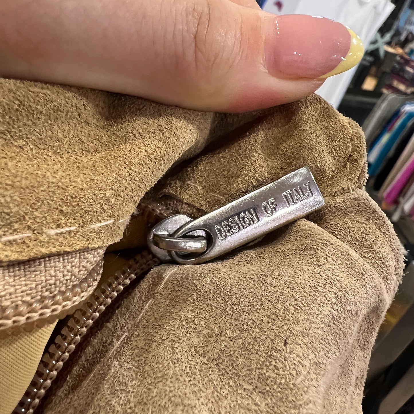beige suede shoulder bag with fringes