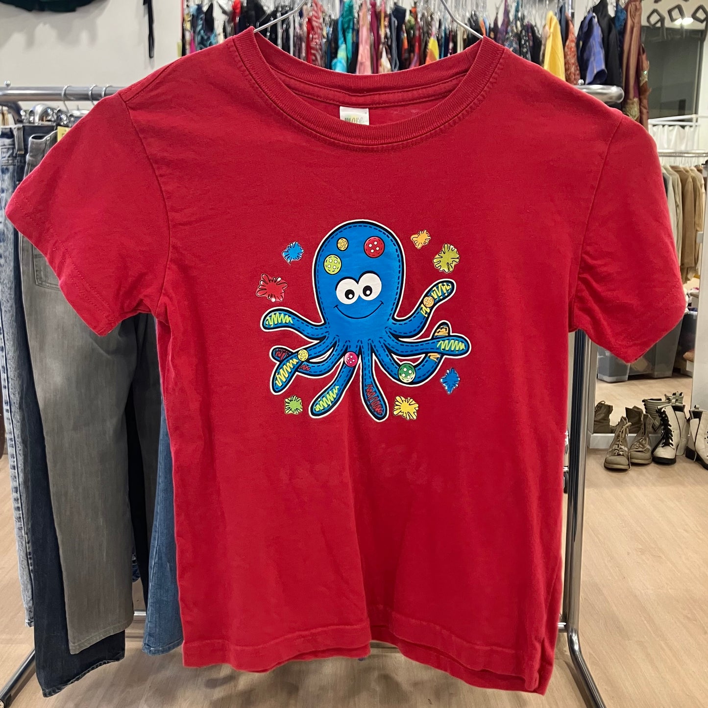 more red tshirt with blue octopus graphic