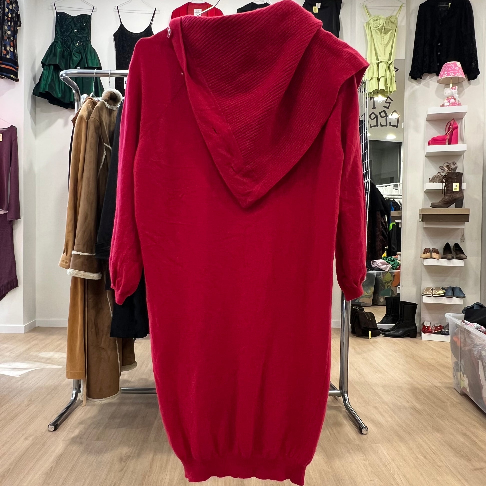 Red hoodie on a rack in a clothing store