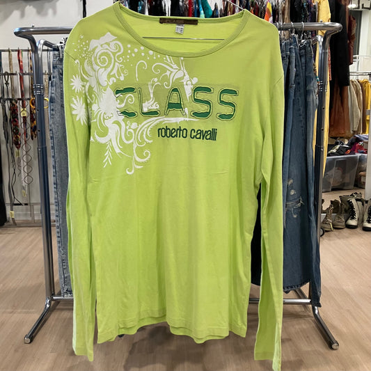 Green long-sleeve shirt with 'Roberto Cavalli' branding on a clothing rack