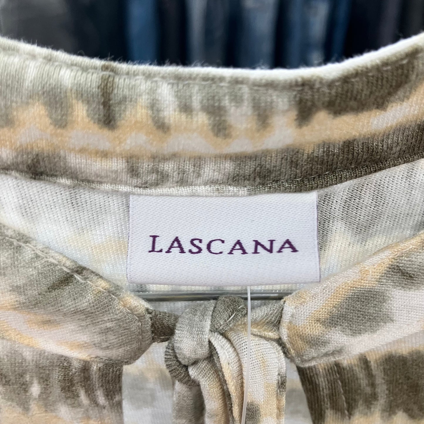 Close-up of a patterned fabric with a Lascana label