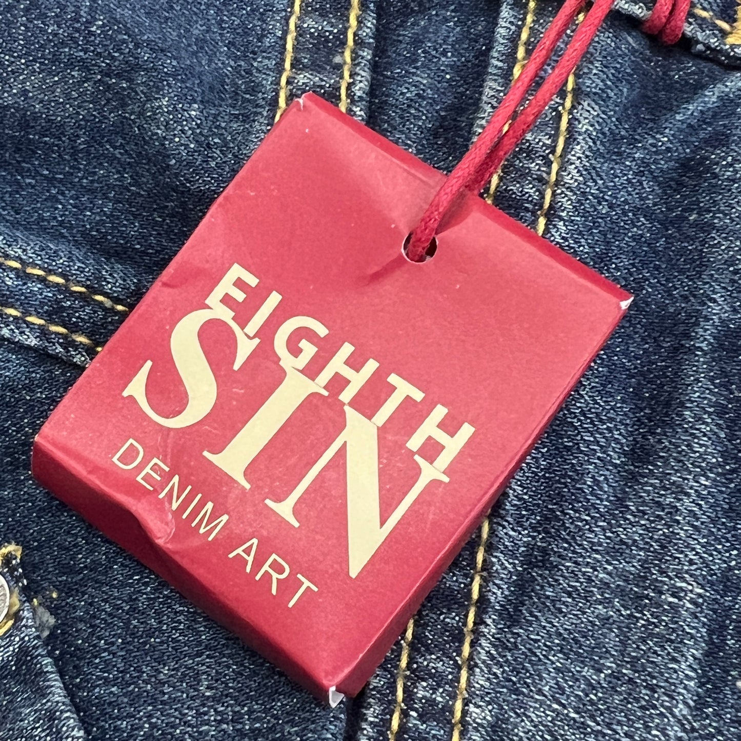 eighth sin 00s distressed dark wash mini skirt with pearls and secret inside pocket