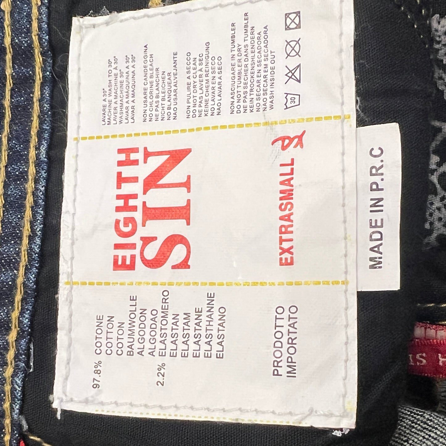 eighth sin 00s distressed dark wash mini skirt with pearls and secret inside pocket