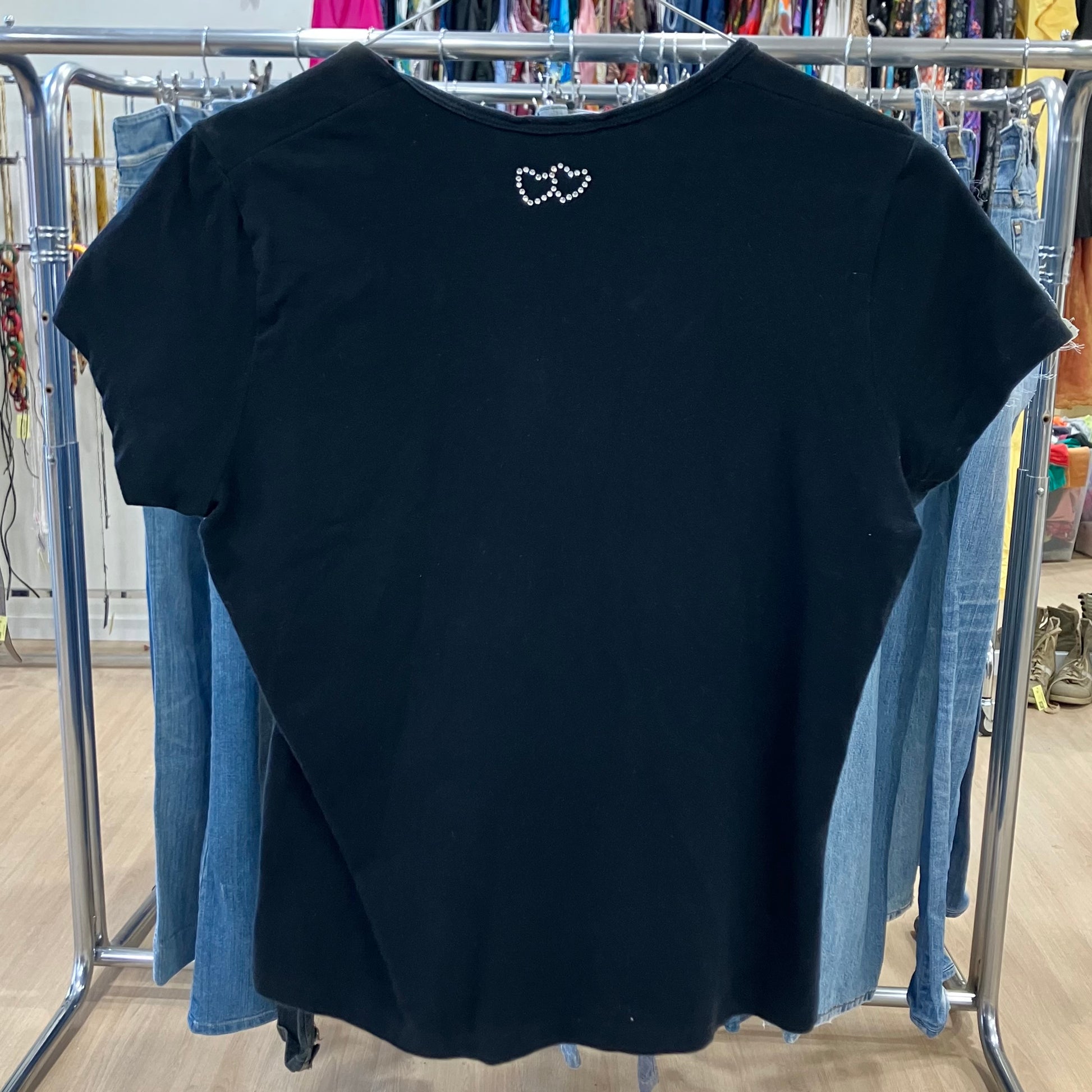 Black short sleeve top with rhinestone heart detail on back, sustainable fashion piece