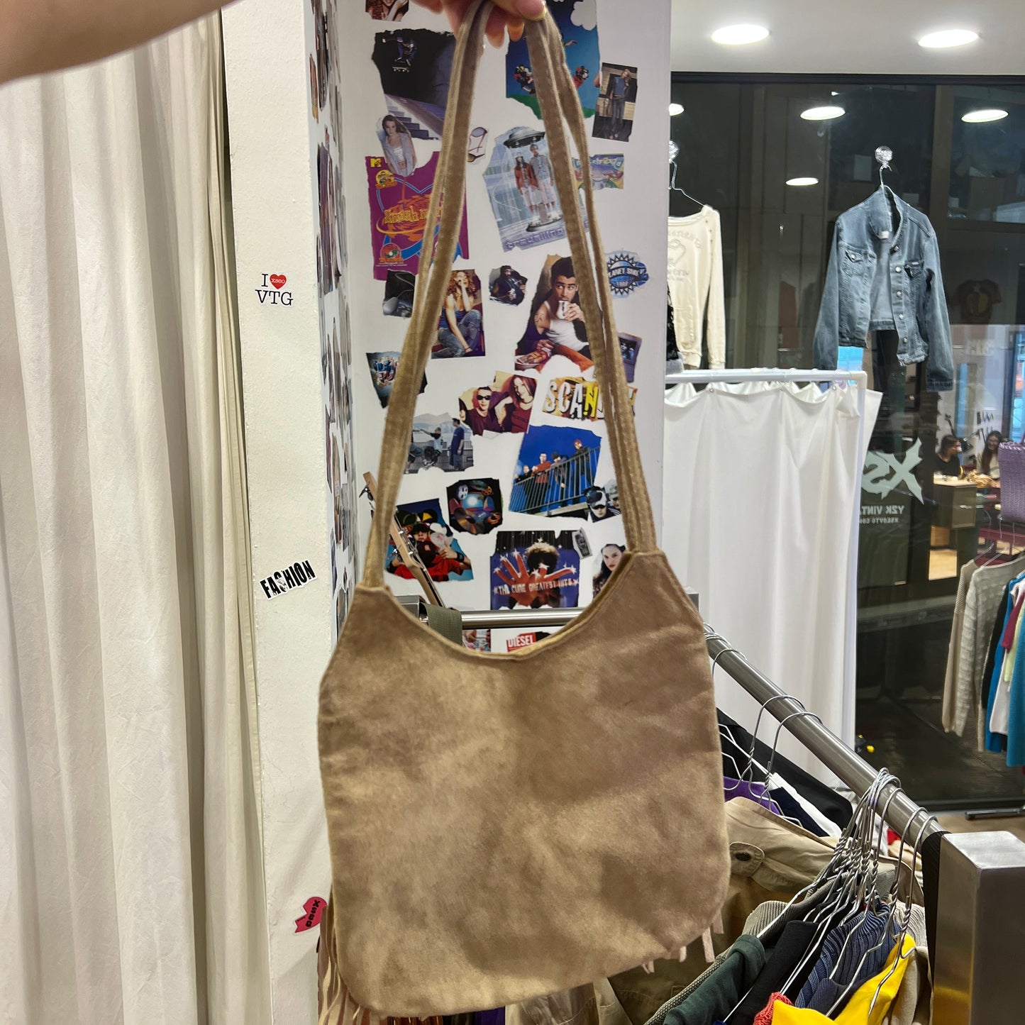 beige suede shoulder bag with fringes