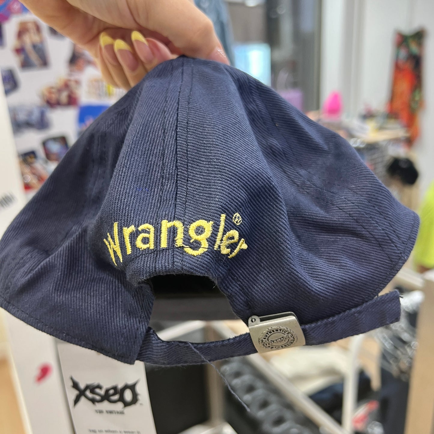 wrangler navy blue baseball cap with yellow embroidered logo