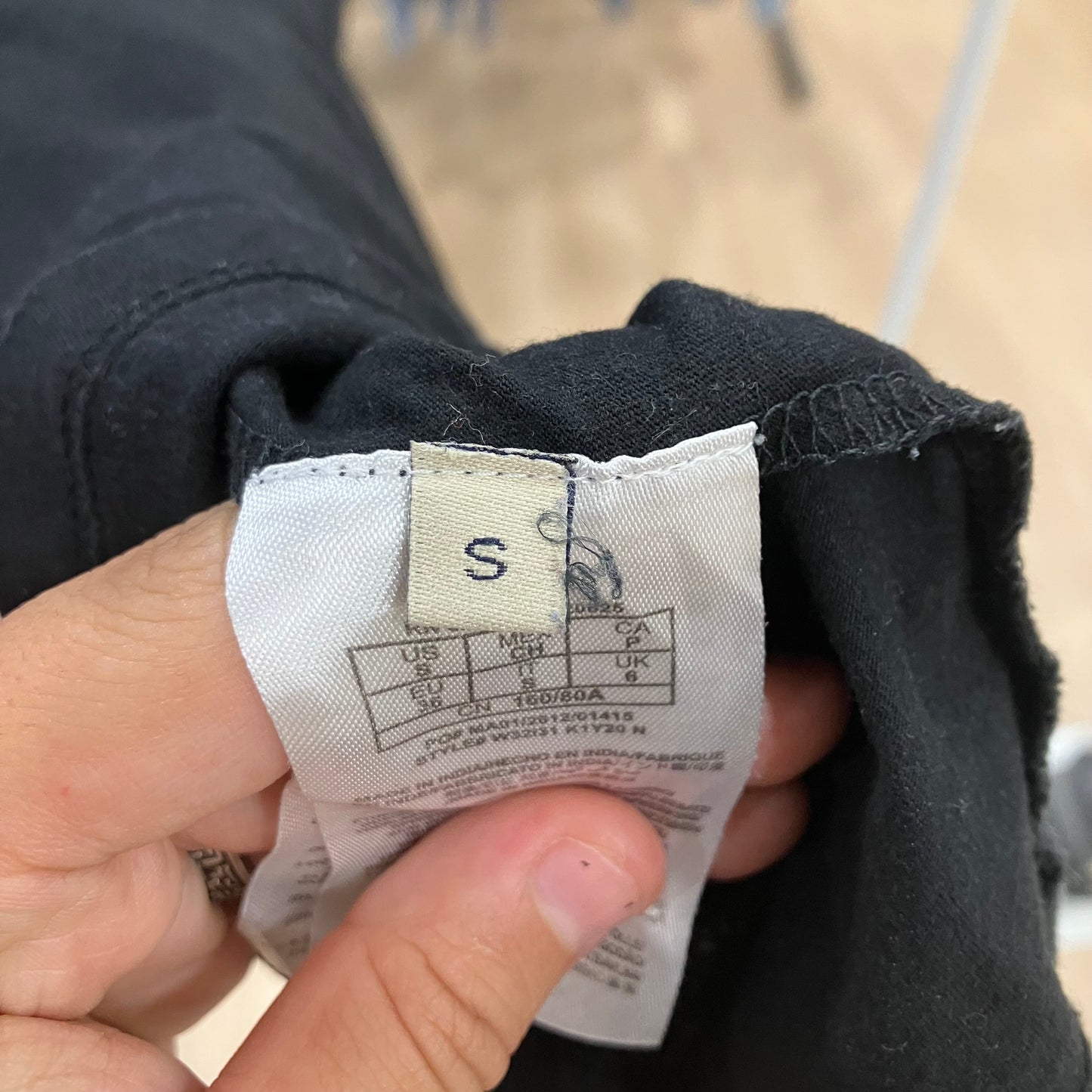 guess 00s black tee with gold lettering and embroidery