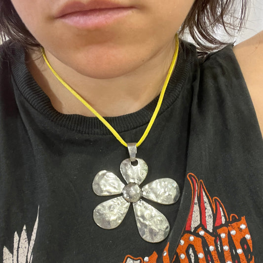 silver metal maxi flower pendant necklace with yellow adjustable faux suede string