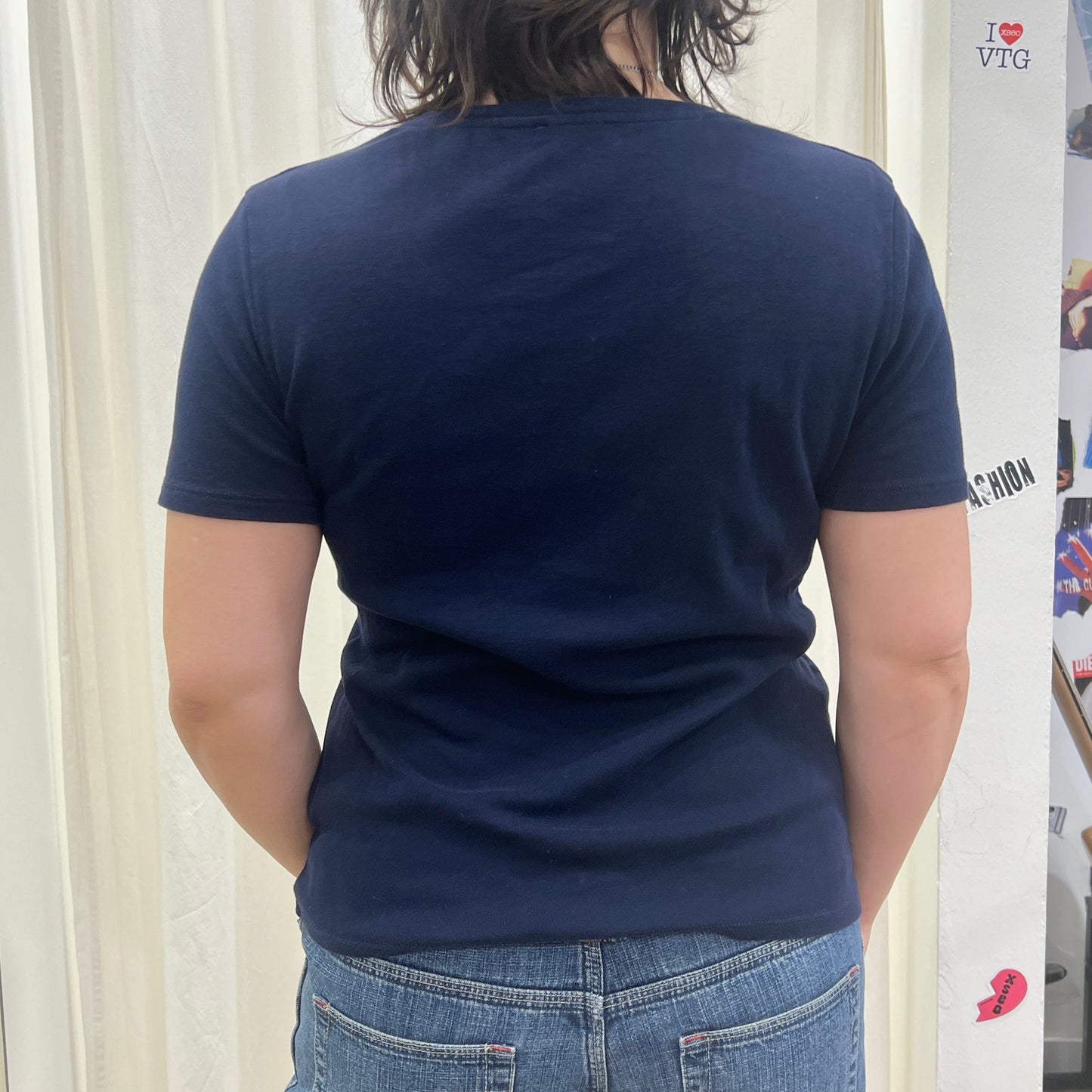 reworked navy blue v neck tshirt with FUCK ICE bleach print