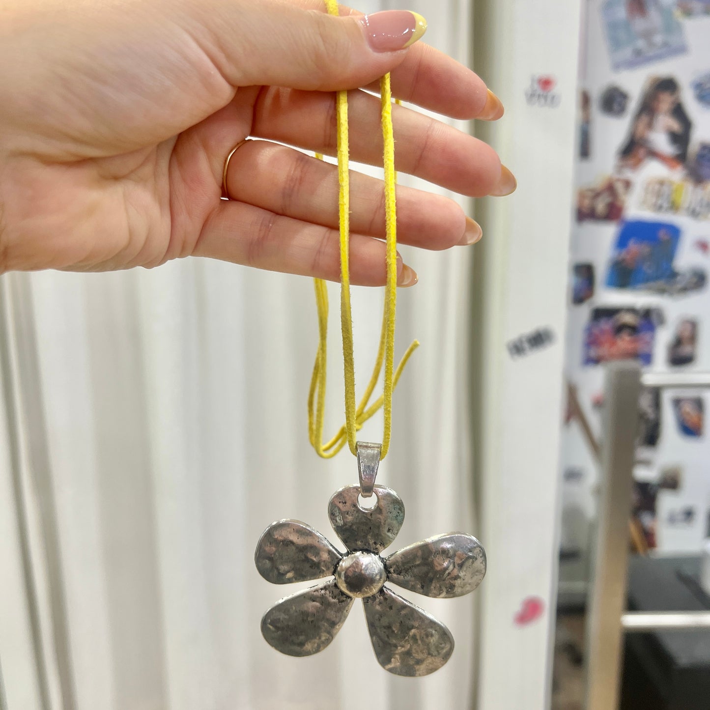 silver metal maxi flower pendant necklace with yellow adjustable faux suede string