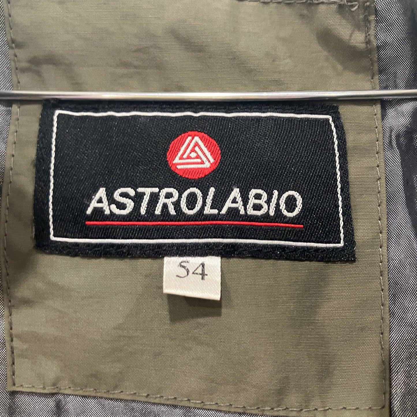 Close-up of an Astrolabio label on a piece of fabric