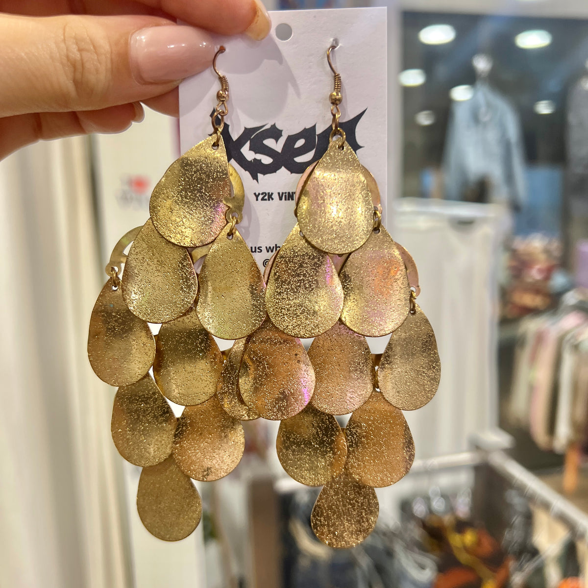 gold oval shaped cascading earrings