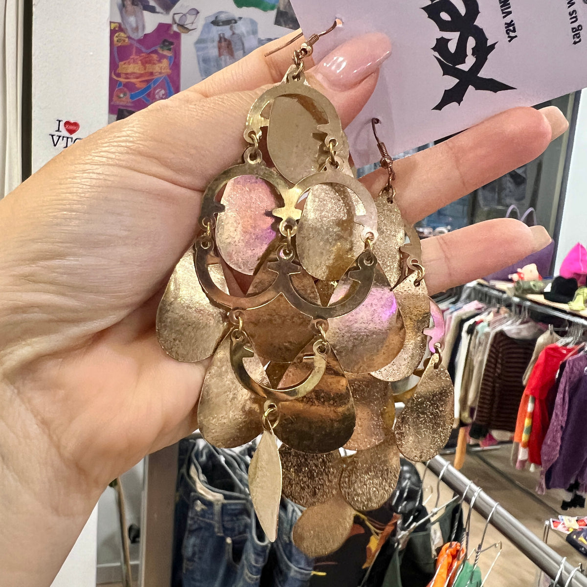 gold oval shaped cascading earrings