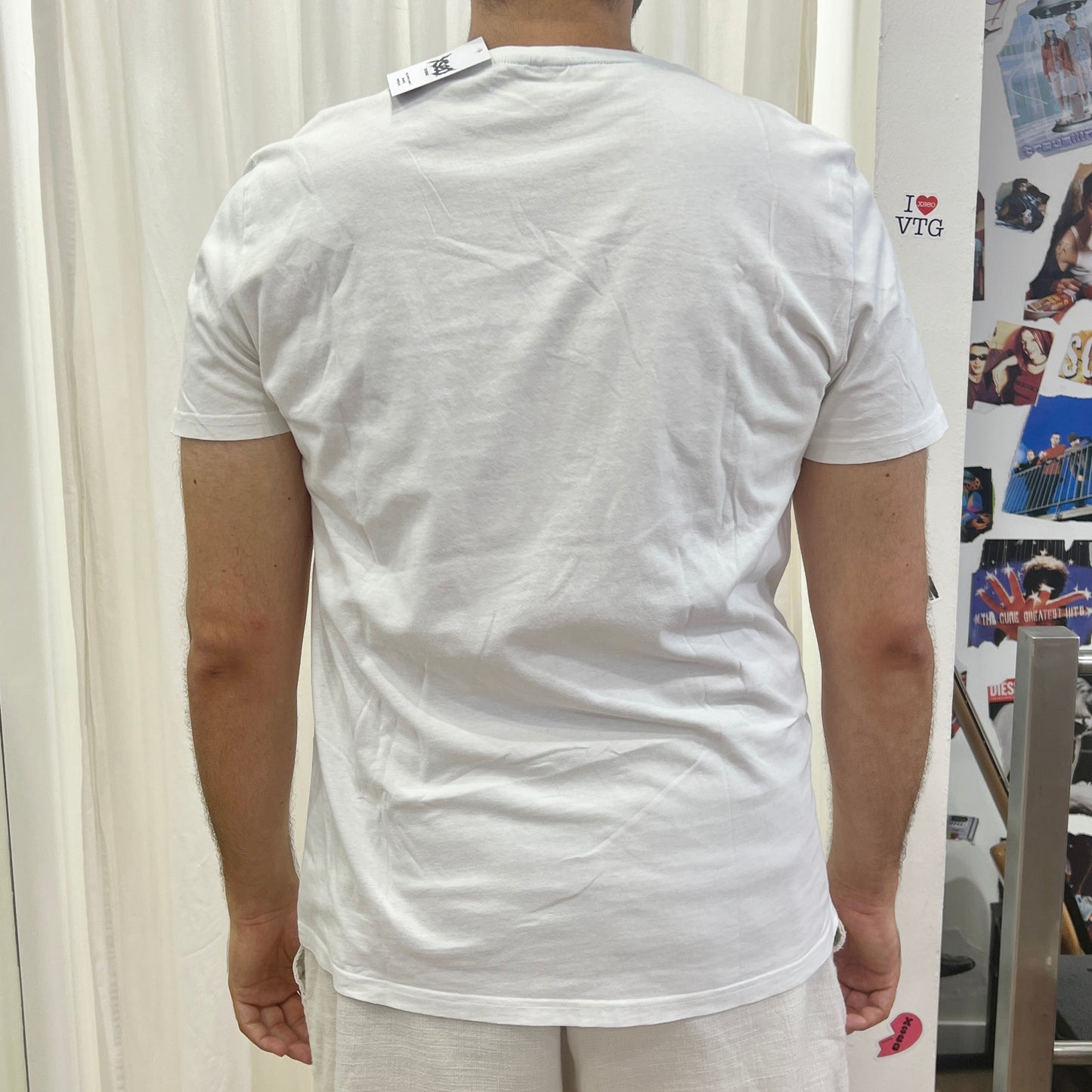 NFL white tee with blue red shield logo