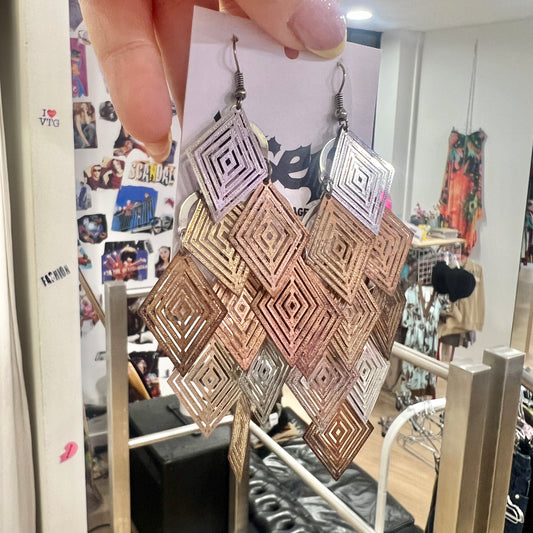 silver bronze metal cascading cut-out diamond earrings