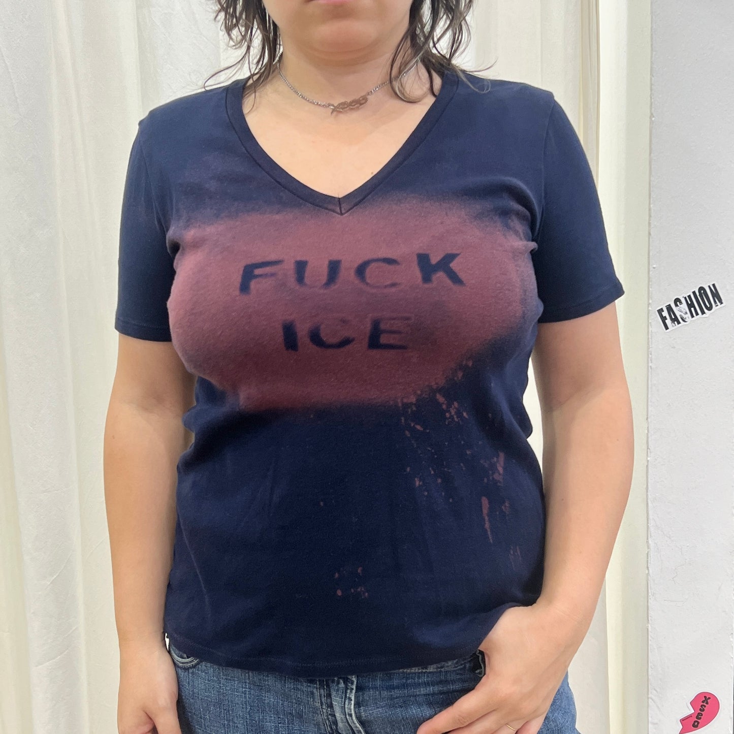 reworked navy blue v neck tshirt with FUCK ICE bleach print