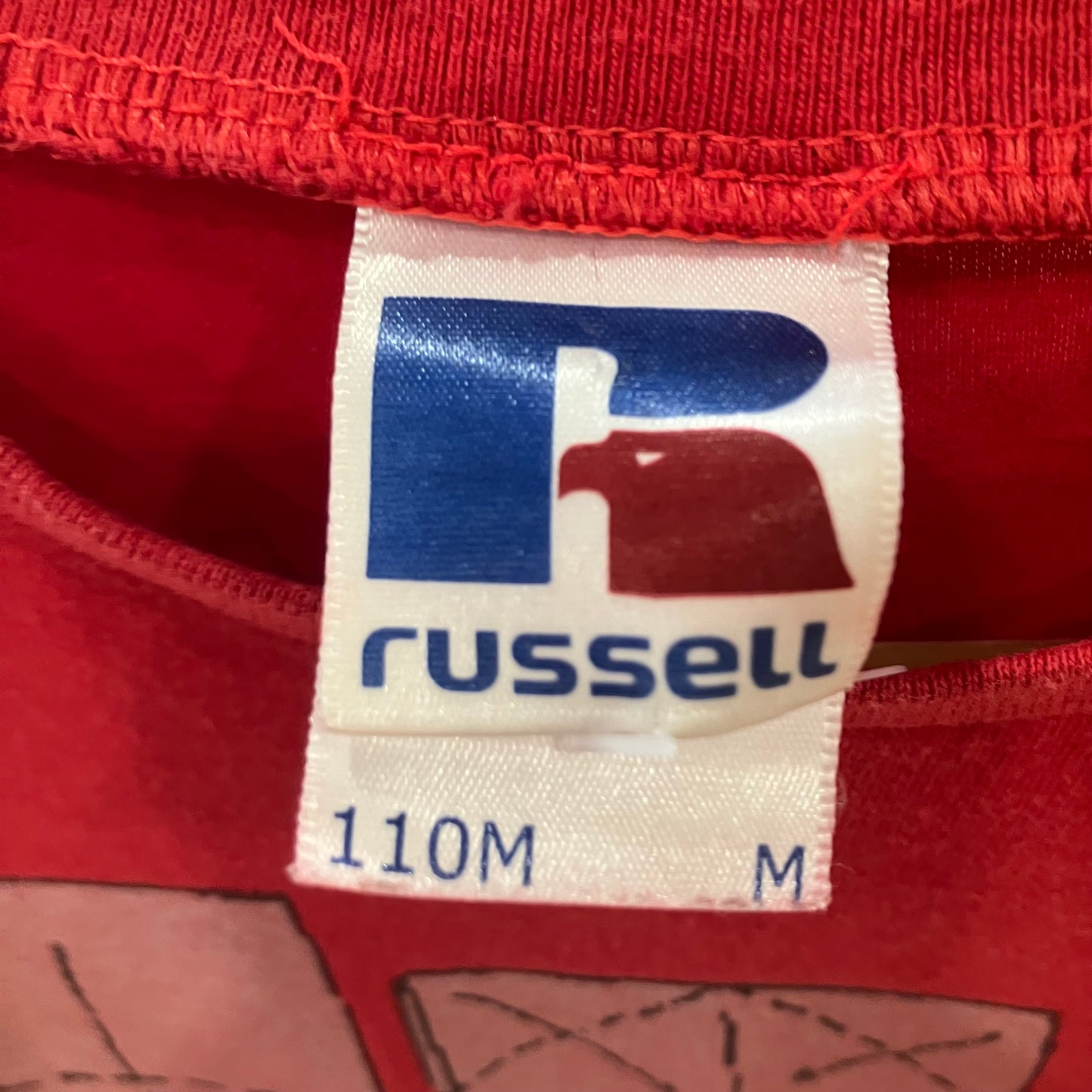 russell 00s red tshirt with paper boat design