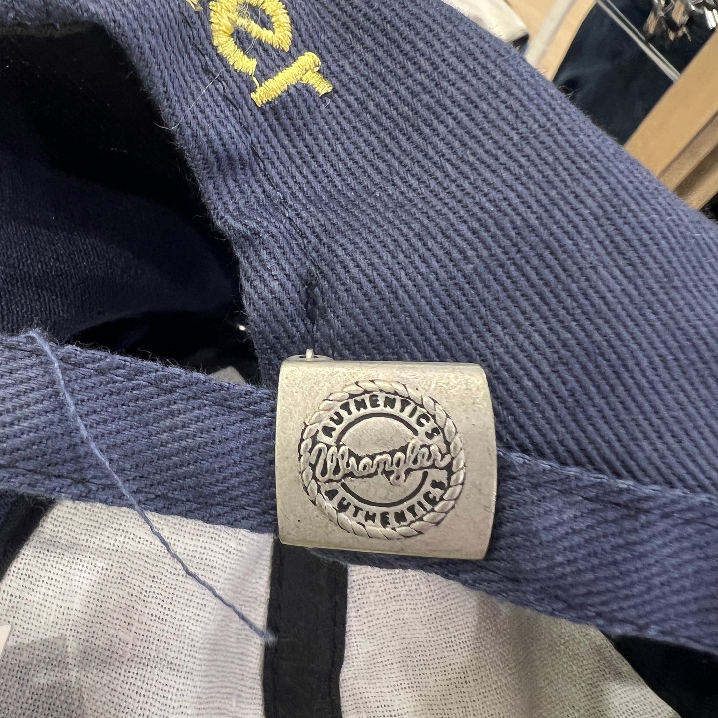 wrangler navy blue baseball cap with yellow embroidered logo