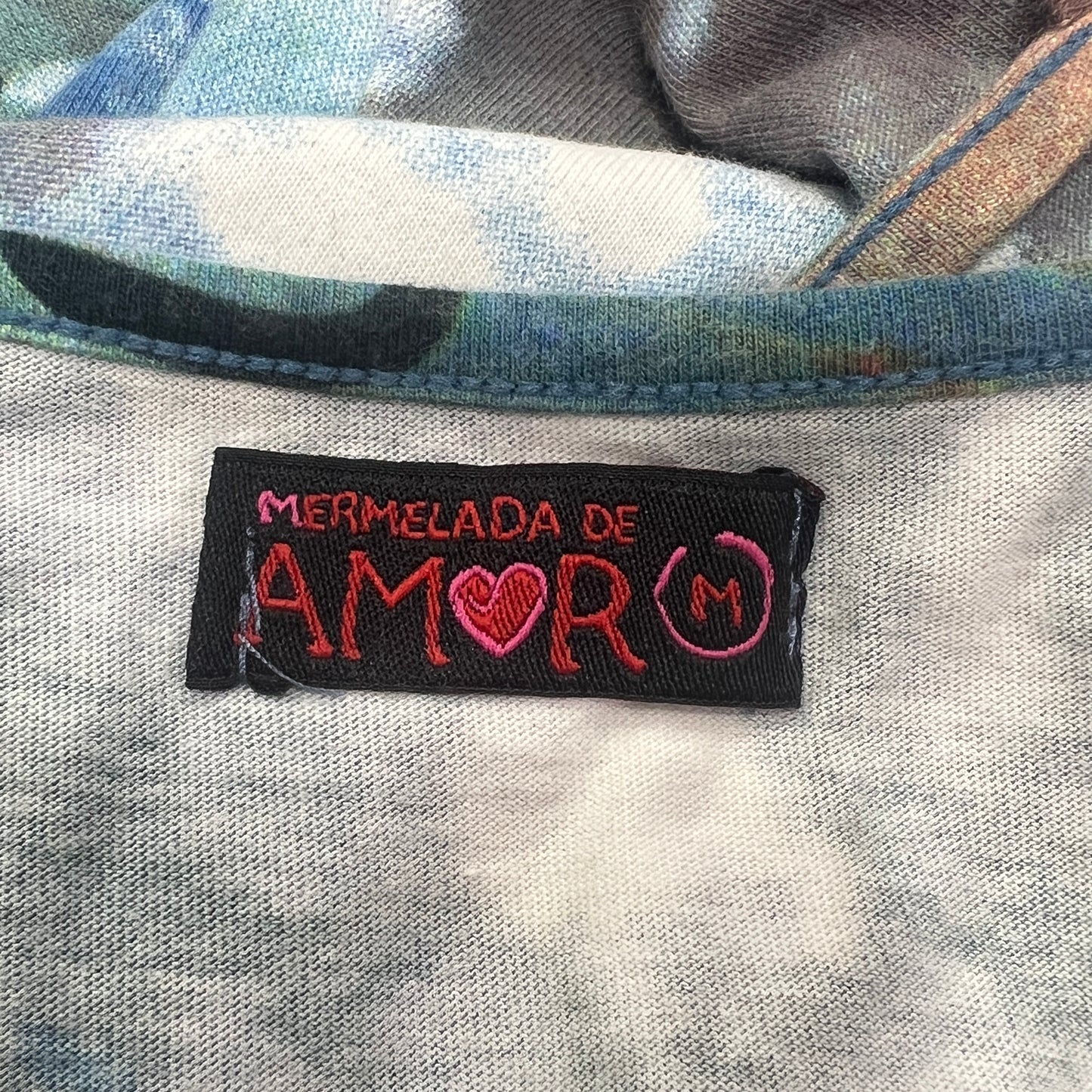 mermelada de amor 00s blue red mundo magico graphic tank top