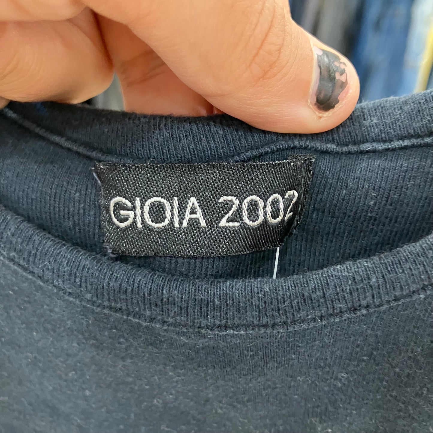GIOIA 2007 label on a dark fabric background