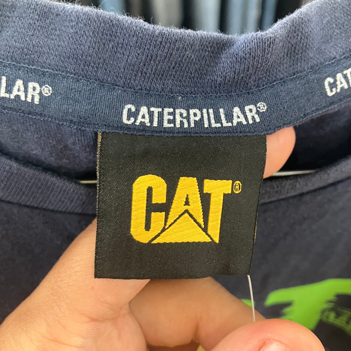 Caterpillar logo tag on a piece of clothing