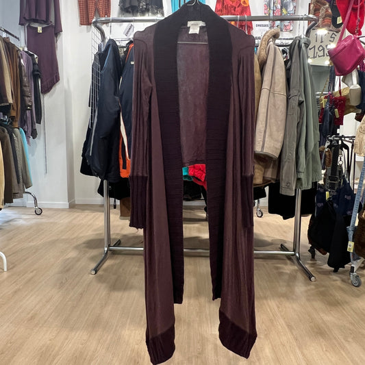 Brown cardigan on a rack in a clothing store